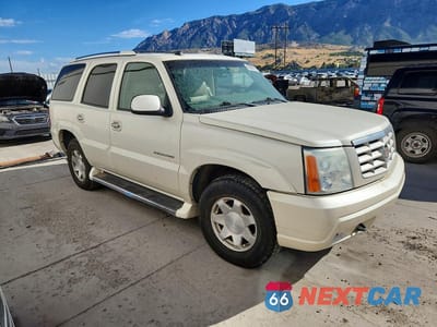 Czwarte zdjęcie samochodu z boku: 2004 CADILLAC ESCALADE LUXURY VIN:1GYEK63N34R261161 - miniatura