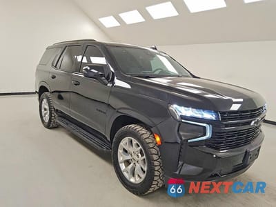 Czwarte zdjęcie samochodu z boku: 2023 CHEVROLET TAHOE C1500 RST VIN:1GNSCRKD0PR446876 - miniatura