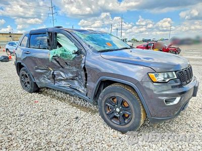 Czwarte zdjęcie samochodu z boku: 2017 JEEP GRAND CHEROKEE LAREDO VIN:1C4RJFAG9HC884677 - miniatura