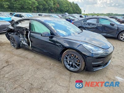 Czwarte zdjęcie samochodu z boku: 2021 TESLA MODEL 3 VIN:5YJ3E1EB4MF961013 - miniatura