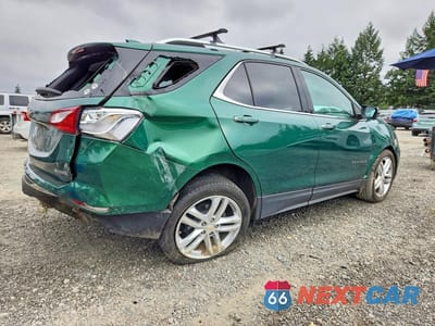 Trzecie zdjęcie samochodu z tyłu: 2018 CHEVROLET EQUINOX PREMIER VIN:2GNAXNEX5J6145134 - miniatura