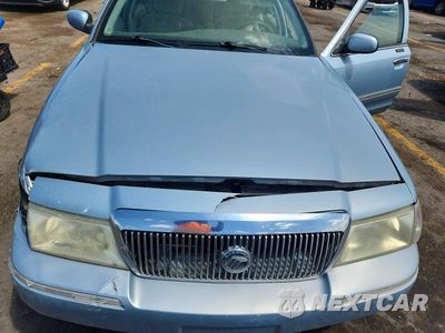 Zdjęcie 11 z 12 samochodu: 2004 MERCURY GRAND MARQUIS GS VIN:2MEFM74WX4X692442 - miniatura
