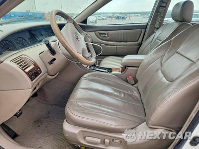 Zdjęcie 7 z 12 samochodu: 2003 TOYOTA AVALON XL VIN:4T1BF28B03U290578 - miniatura