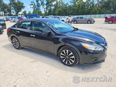 Czwarte zdjęcie samochodu z boku: 2018 NISSAN ALTIMA 2.5 SV VIN:1N4AL3AP8JC155166 - miniatura