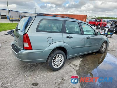 Trzecie zdjęcie samochodu z tyłu: 2003 FORD FOCUS SE VIN:1FAFP36383W213942 - miniatura