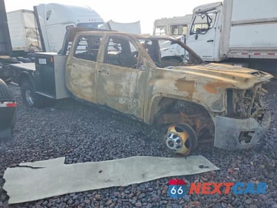 Czwarte zdjęcie samochodu z boku: 2017 GMC SIERRA K3500 DENALI VIN:1GT42YEY4HF193481 - miniatura