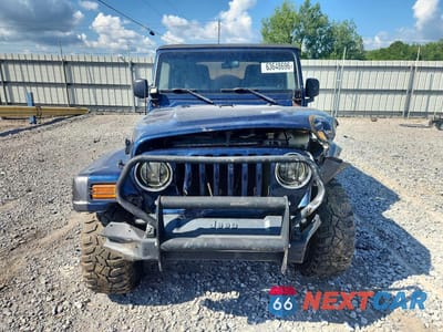 Piąte zdjęcie samochodu w środku: 2004 JEEP WRANGLER X VIN:1J4FA39S94P798017 - miniatura