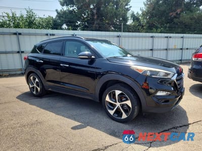 Czwarte zdjęcie samochodu z boku: 2016 HYUNDAI TUCSON LIMITED VIN:KM8J33A23GU129541 - miniatura