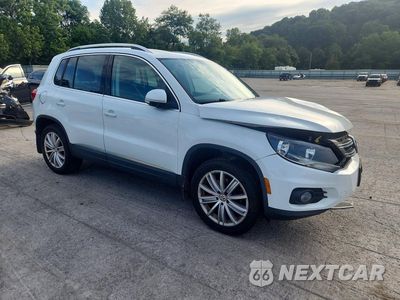 Czwarte zdjęcie samochodu z boku: 2015 VOLKSWAGEN TIGUAN S VIN:WVGBV7AX7FW583943 - miniatura