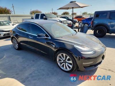 Czwarte zdjęcie samochodu z boku: 2018 TESLA MODEL 3 VIN:5YJ3E1EB1JF115708 - miniatura