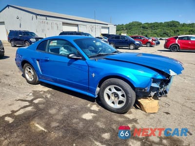 Czwarte zdjęcie samochodu z boku: 2000 FORD MUSTANG VIN:1FAFP4041YF157891 - miniatura