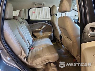 Zdjęcie 11 z 13 samochodu: 2014 FORD ESCAPE TITANIUM VIN:1FMCU0J97EUB39729 - miniatura
