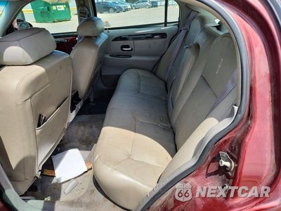 Zdjęcie 10 z 12 samochodu: 2001 LINCOLN TOWN CAR SIGNATURE VIN:1LNHM82W01Y629795 - miniatura