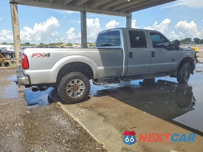 Trzecie zdjęcie samochodu z tyłu: 2014 FORD F350 SUPER DUTY VIN:1FT8W3BT8EEA37589 - miniatura