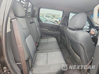 Zdjęcie 10 z 12 samochodu: 2007 HONDA RIDGELINE RTX VIN:2HJYK16377H509492 - miniatura
