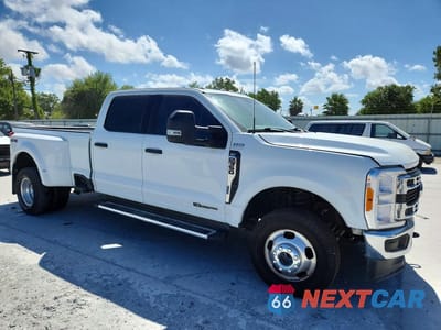 Czwarte zdjęcie samochodu z boku: 2023 FORD F350 SUPER DUTY VIN:1FT8W3DT3PEC69078 - miniatura