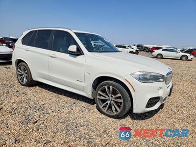 Czwarte zdjęcie samochodu z boku: 2014 BMW X5 XDRIVE50I VIN:5UXKR6C55E0J73012 - miniatura