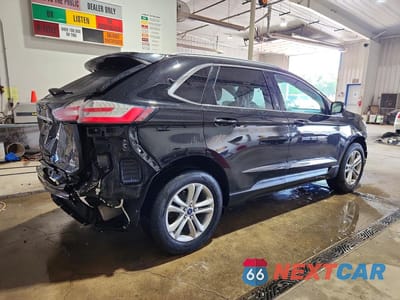 Trzecie zdjęcie samochodu z tyłu: 2020 FORD EDGE SEL VIN:2FMPK4J9XLBA22163 - miniatura