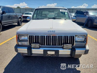 Piąte zdjęcie samochodu w środku: 1990 JEEP CHEROKEE LAREDO VIN:1J4FJ58L4LL167588 - miniatura