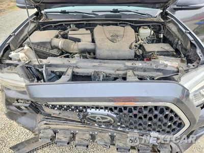 Zdjęcie 11 z 12 samochodu: 2018 TOYOTA TACOMA TRD OFF-ROAD VIN:3TMDZ5BN6JM050980 - miniatura