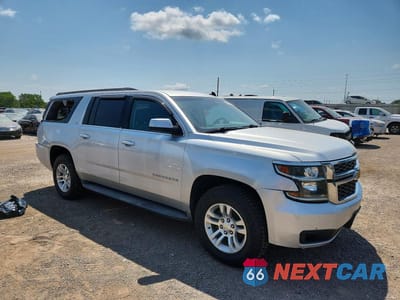 Czwarte zdjęcie samochodu z boku: 2015 CHEVROLET SUBURBAN K1500 LT VIN:1GNSKJKC6FR195193 - miniatura