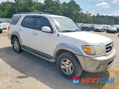 Czwarte zdjęcie samochodu z boku: 2004 TOYOTA SEQUOIA SR5 VIN:5TDZT34A24S223968 - miniatura