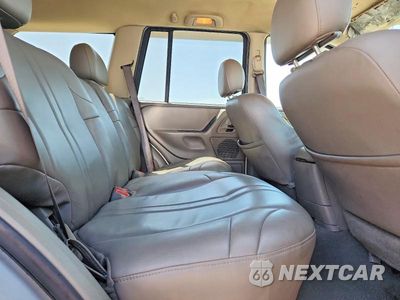 Zdjęcie 11 z 13 samochodu: 2004 JEEP GRAND CHEROKEE LAREDO VIN:1J4GX48S04C386019 - miniatura