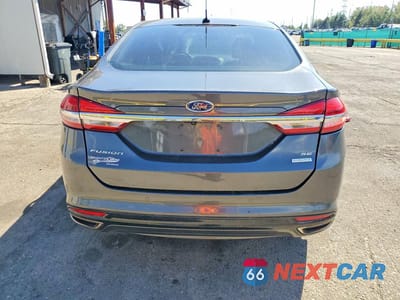 Zdjęcie 6 z 12 samochodu: 2018 FORD FUSION SE VIN:3FA6P0T9XJR262535 - miniatura