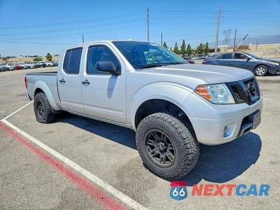 Czwarte zdjęcie samochodu z boku: 2013 NISSAN FRONTIER SV VIN:1N6AD0FR8DN717380 - miniatura