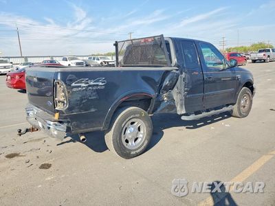 Trzecie zdjęcie samochodu z tyłu: 1999 FORD F150 VIN:1FTRX18L0XNB90225 - miniatura