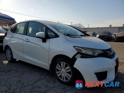 Czwarte zdjęcie samochodu z boku: 2017 HONDA FIT LX VIN:JHMGK5H53HS020263 - miniatura