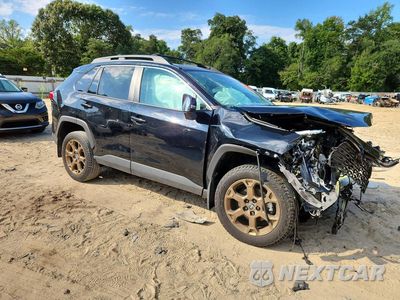 Czwarte zdjęcie samochodu z boku: 2024 TOYOTA RAV4 WOODLAND EDITION VIN:2T3UWRFV8RW239277 - miniatura