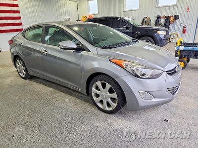 Czwarte zdjęcie samochodu z boku: 2012 HYUNDAI ELANTRA LIMITED VIN:KMHDH4AE4CU342958 - miniatura