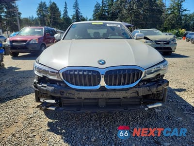 Piąte zdjęcie samochodu w środku: 2021 BMW 330I VIN:3MW5R1J04M8B70273 - miniatura