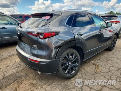 Trzecie zdjęcie samochodu z tyłu: 2022 MAZDA CX-30 PREMIUM VIN:3MVDMBDY6NM459277 - miniatura