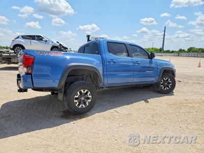 Trzecie zdjęcie samochodu z tyłu: 2019 TOYOTA TACOMA SR V6 VIN:5TFCZ5AN1KX179153 - miniatura