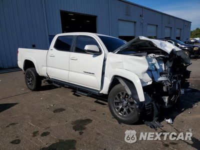 Czwarte zdjęcie samochodu z boku: 2022 TOYOTA TACOMA SR5 V6 VIN:3TYDZ5BN8NT015285 - miniatura