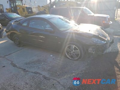 Czwarte zdjęcie samochodu z boku: 2005 MITSUBISHI ECLIPSE GTS VIN:4A3AC74H65E024878 - miniatura