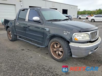 Czwarte zdjęcie samochodu z boku: 2001 FORD F150 SUPERCREW VIN:1FTRW07L71KC60939 - miniatura