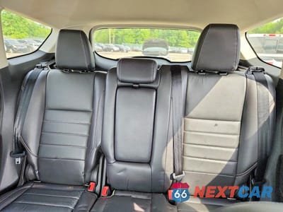 Zdjęcie 10 z 13 samochodu: 2016 FORD ESCAPE TITANIUM VIN:1FMCU9J98GUB90633 - miniatura
