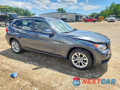 Czwarte zdjęcie samochodu z boku: 2014 BMW X1 XDRIVE28I VIN:WBAVL1C53EVR94368 - miniatura