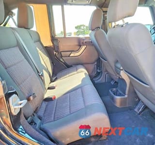 Zdjęcie 10 z 12 samochodu: 2011 JEEP WRANGLER UNLIMITED RUBICON VIN:1J4BA6H17BL593471 - miniatura