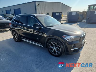 Czwarte zdjęcie samochodu z boku: 2018 BMW X1 XDRIVE28I VIN:WBXHT3C38J5F91772 - miniatura