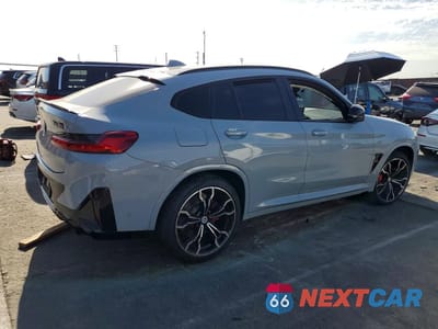Trzecie zdjęcie samochodu z tyłu: 2022 BMW X4 M VIN:5YM23EC03N9M71823 - miniatura