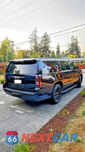Czwarte zdjęcie samochodu z boku: 2018 GMC YUKON XL K1500 SLT VIN:1GKS2GKC2JR383153 - miniatura