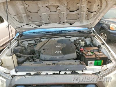 Zdjęcie 11 z 12 samochodu: 2014 TOYOTA TACOMA V6 VIN:3TMLU4EN6EM135713 - miniatura