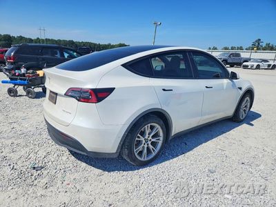 Trzecie zdjęcie samochodu z tyłu: 2021 TESLA MODEL Y VIN:5YJYGDEE2MF192992 - miniatura