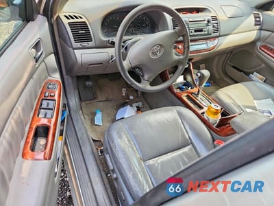 Zdjęcie 8 z 12 samochodu: 2004 TOYOTA CAMRY XLE VIN:4T1BE32K84U886749 - miniatura