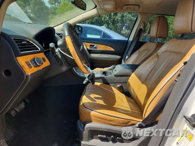 Zdjęcie 7 z 13 samochodu: 2011 LINCOLN MKX VIN:2LMDJ8JK2BBJ16279 - miniatura