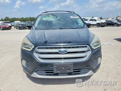 Piąte zdjęcie samochodu w środku: 2017 FORD ESCAPE TITANIUM VIN:1FMCU0J99HUA60857 - miniatura